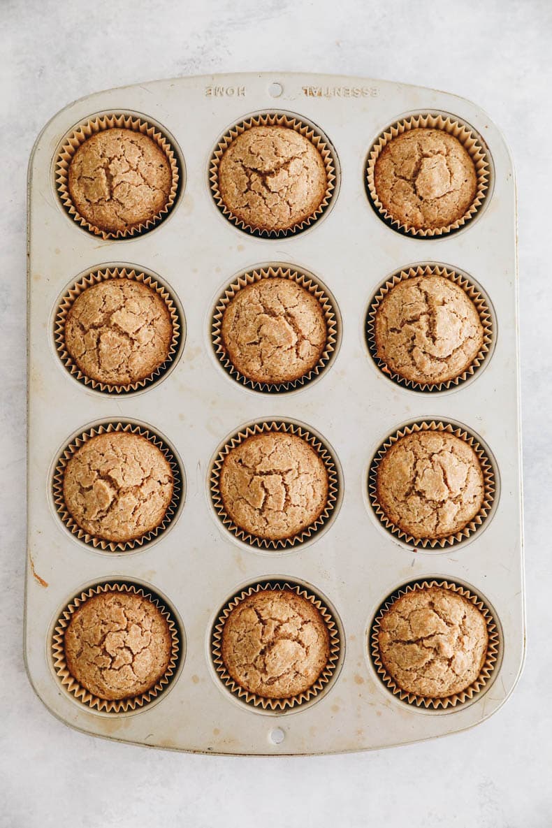 a muffin tin with baked baby muffins