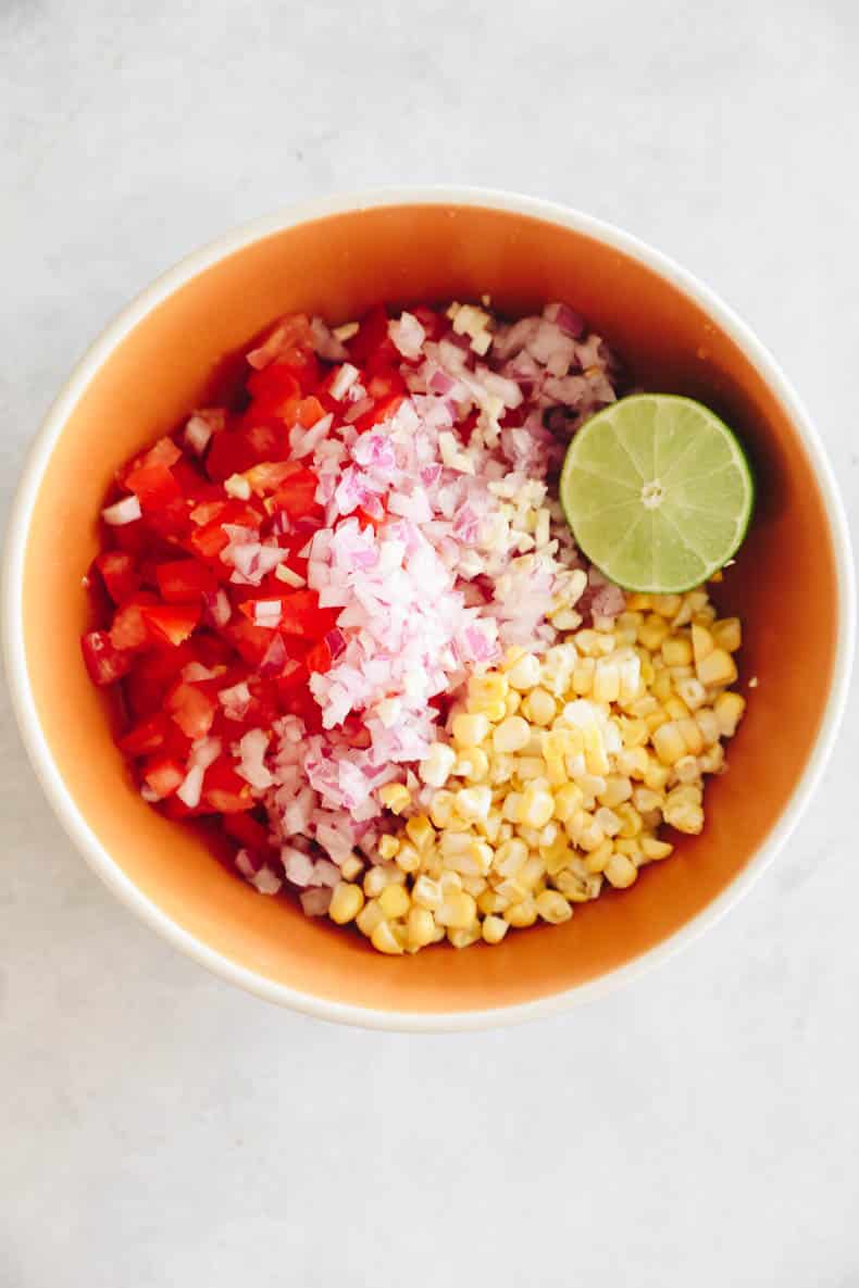 corn salsa in a mixing bowl.