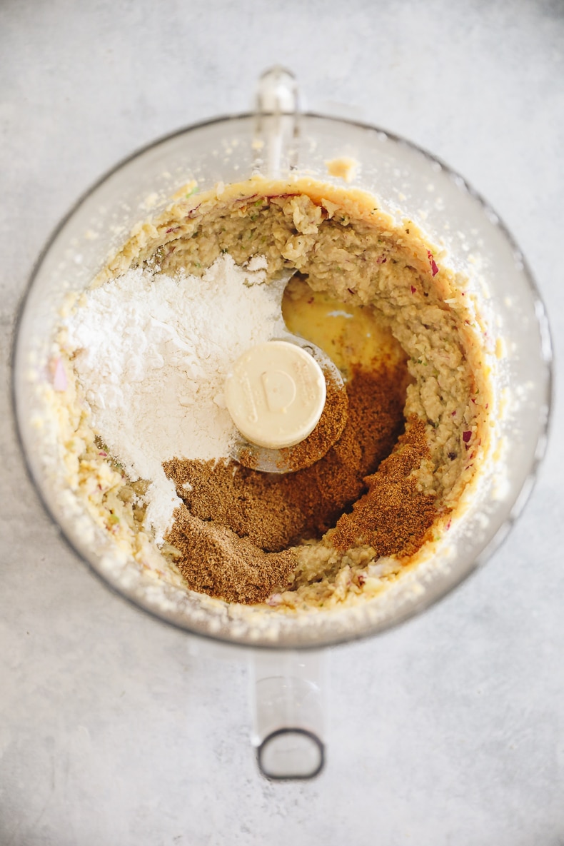 All ingredients for a falafel  burger recipe in a food processor