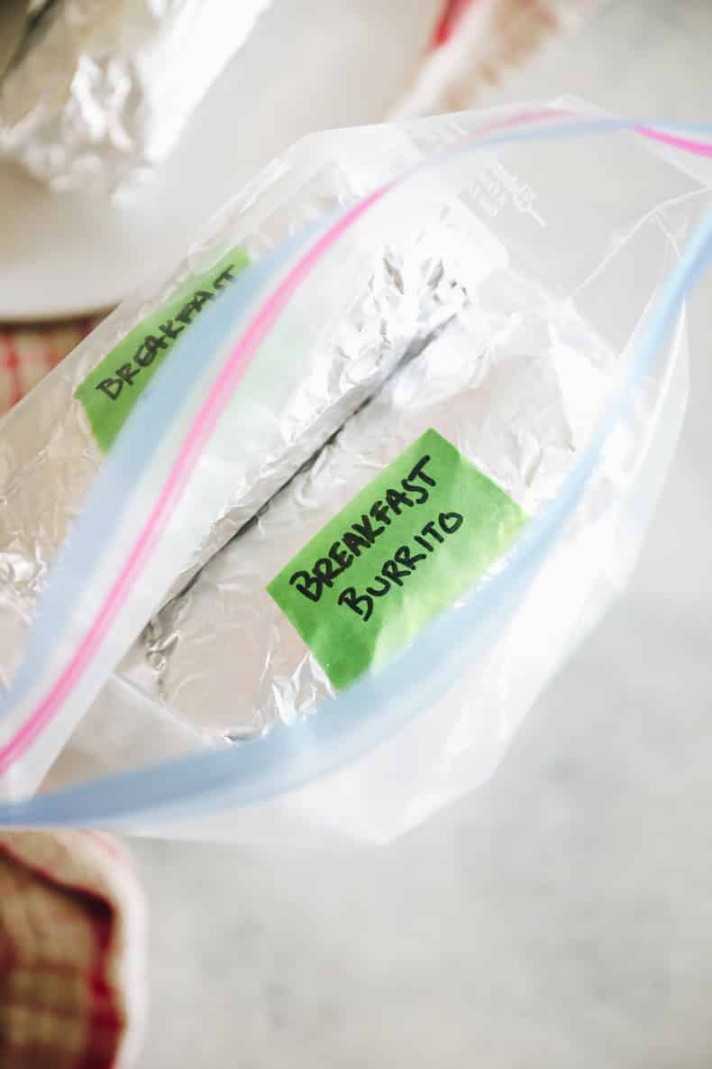 breakfast burritos wrapped in tinfoil and stored in a ziploc bag.