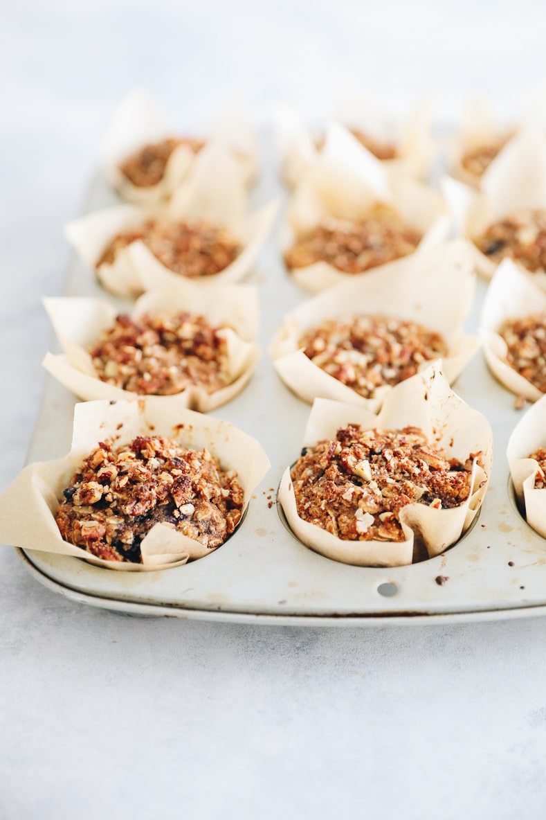 Baked Blueberry Oatmeal Muffins in a muffin tin