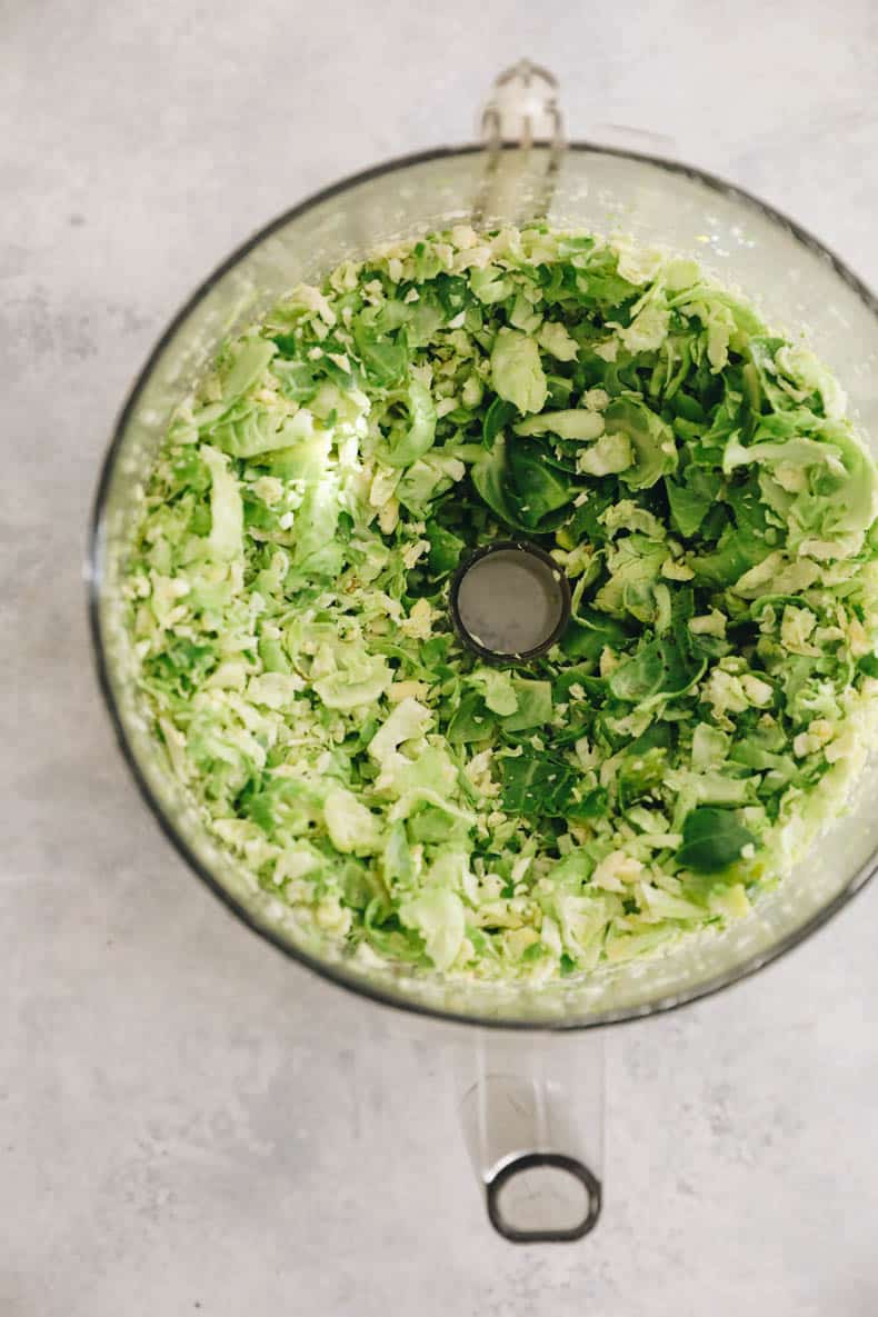 shredded brussel sprouts in a food processor.